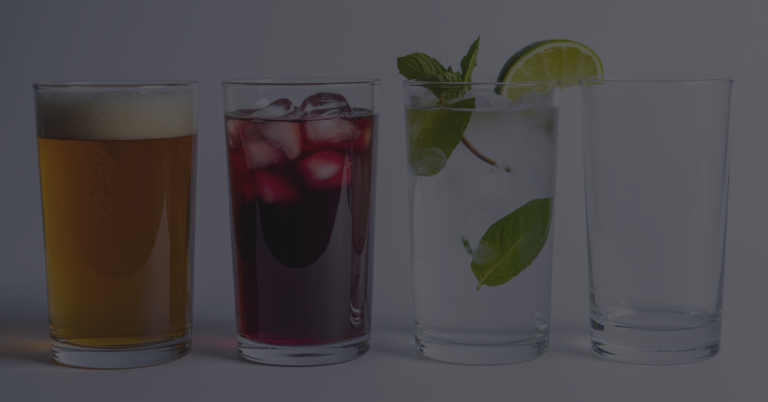 Four glasses with various drinks